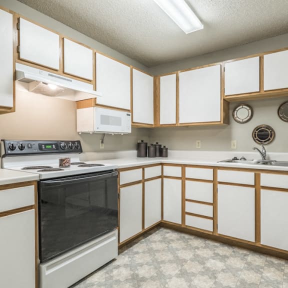 Thumbnail 6 of 9 Large kitchen with many cabinets for storage at Fountain Glen