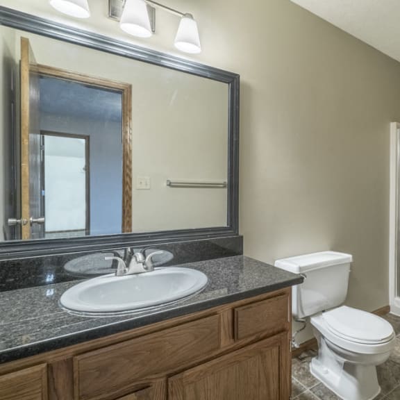 Thumbnail 15 of 15 renovated bathroom with granite counters and large linen closet