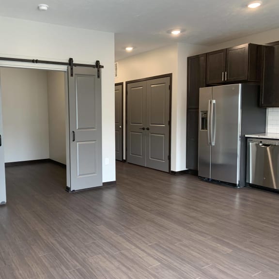 Thumbnail 9 of 18 Den or office space with elegant double barn doors at Haven at Uptown
