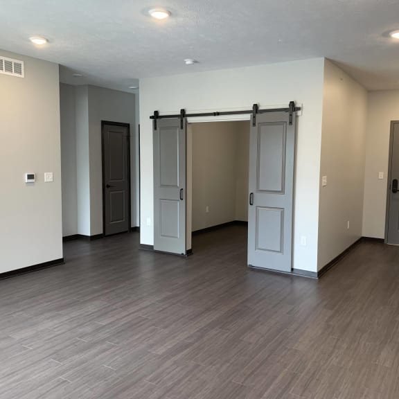 Thumbnail 8 of 18 Open living area with den or office space centrally located