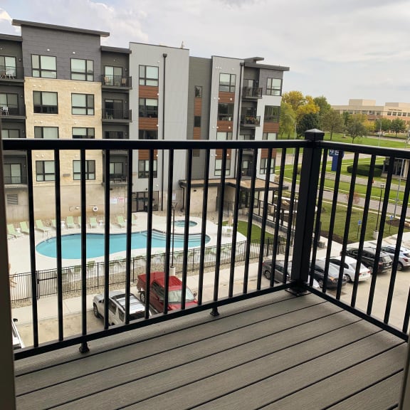 Thumbnail 7 of 18 Exterior balcony off of the living quarters in the Peace floorplan at Haven at Uptown