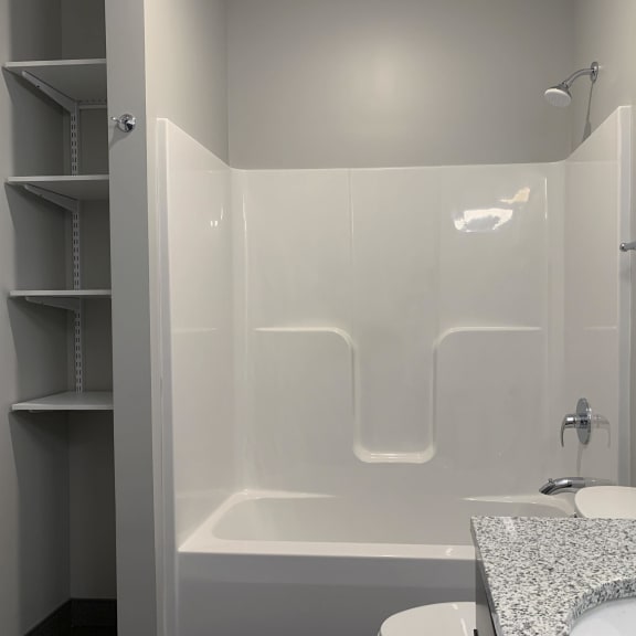 Thumbnail 17 of 18 Shower and tub combo with linen storage close by