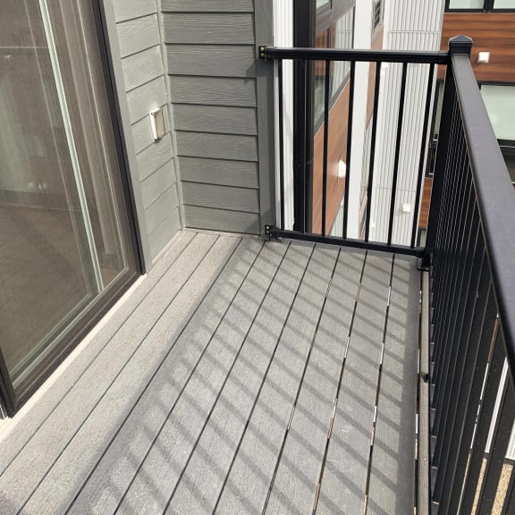 Thumbnail 16 of 17 Spacious deck with a view sliding door and screen door entry