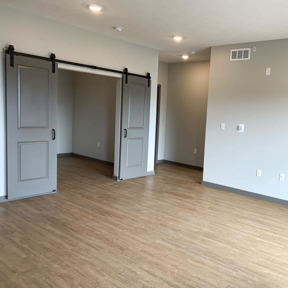 Thumbnail 5 of 17 Large open living dining area with den