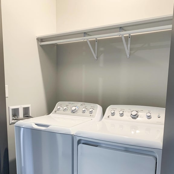 Thumbnail 17 of 17 In unit laundry washer and dryer in closet with shelf for storage