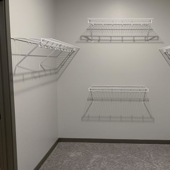 Thumbnail 10 of 13 Walk in closet with hanging and shelving space at haven at uptown