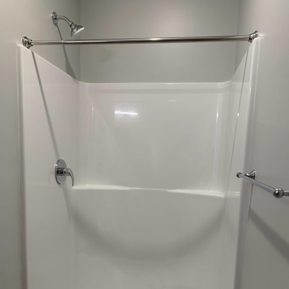 Thumbnail 11 of 11 Built in walk in shower in studio bathroom at Haven at Uptown