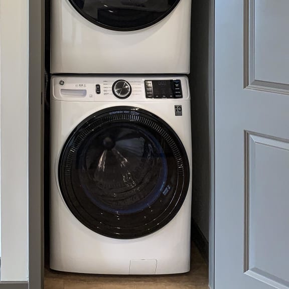 Thumbnail 8 of 8 stacked washer and dryer in closet