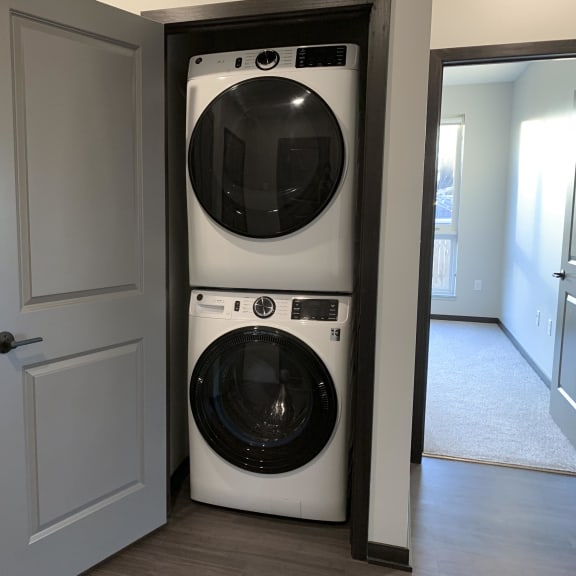 Thumbnail 18 of 18 stacked washer and dryer in closet