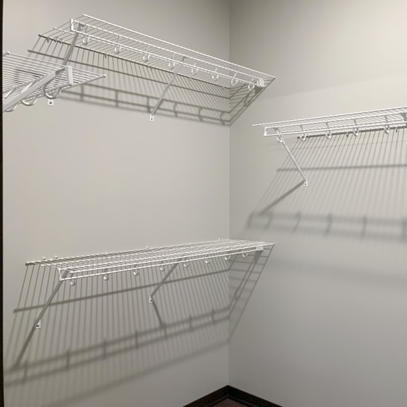 Thumbnail 14 of 18 master bedroom walk in closet shelving