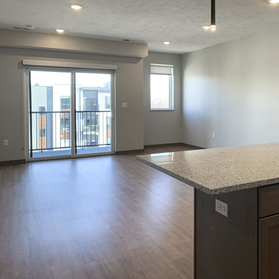 Thumbnail 7 of 16 View of the living area from the kitchen at Haven at Uptown