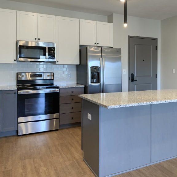 Thumbnail 2 of 16 Kitchen with matching stainless steel appliances and large kitchen island