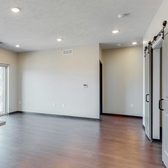 Thumbnail 5 of 17 Spacious living-dining space at Haven at Uptown in Lincoln, NE