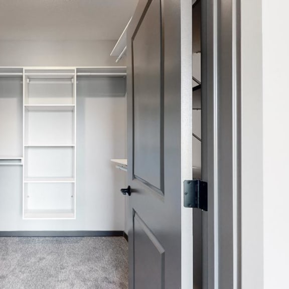 Thumbnail 14 of 17 Large walk in closet that provides plenty of extra storage space for all of your belongings at Haven at Uptown in Lincoln, NE