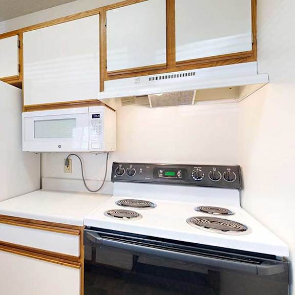 Thumbnail 4 of 29 Kitchen appliances including refrigerator, microwave, and stove