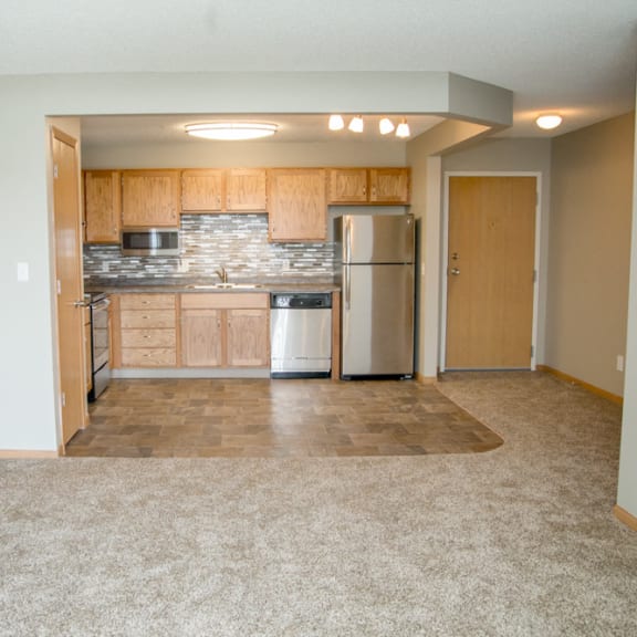 Thumbnail 2 of 11 Open concept view of living room into renovated kitchen