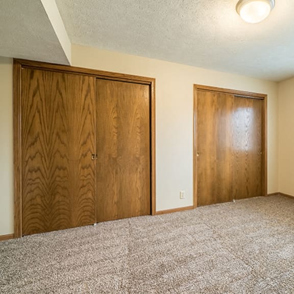 Thumbnail 9 of 15 Bedroom with two closets providing plenty of storage space at Fountain Glen Apartments