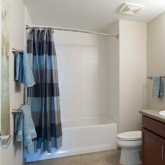 Thumbnail 8 of 10 Bathroom with double sink vanity and white tub/shower