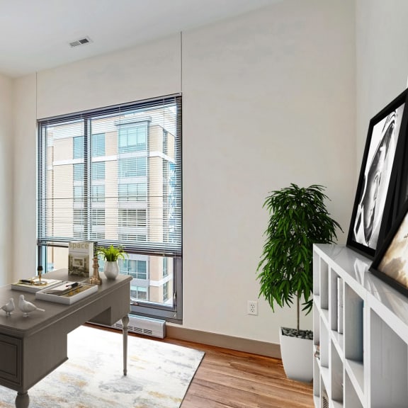 Thumbnail 9 of 22 Bright and spacious bedroom that could be used as home office with floor-to-ceiling windows a 2 bedroom penthouse floor plan Midtown Crossing Apartments Omaha