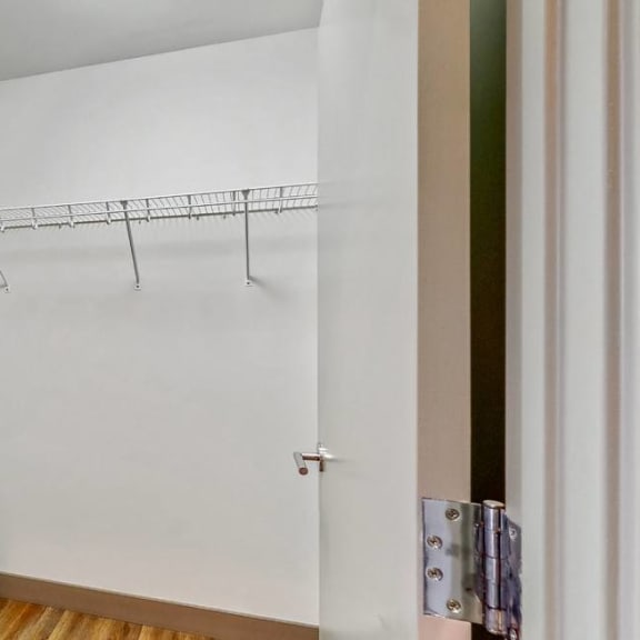 Thumbnail 19 of 22 Easy living with plenty of storage space in the walk in closet of a 2 bedroom penthouse floor plan at Midtown Crossing Apartments Omaha