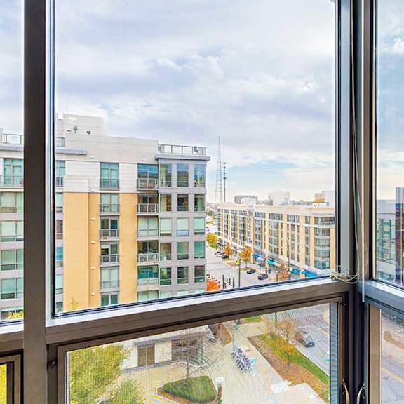 Thumbnail 22 of 24 a stunning view of midtown crossing in Omaha, NE from the corner window in the second bedroom in the 2-bedroom Tucson