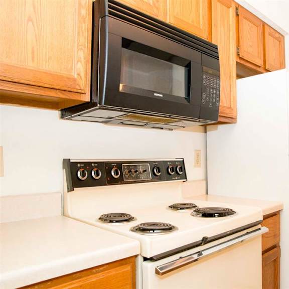 Thumbnail 4 of 9 oven and microwave at Capitol View Apartments in Lincoln Nebraska