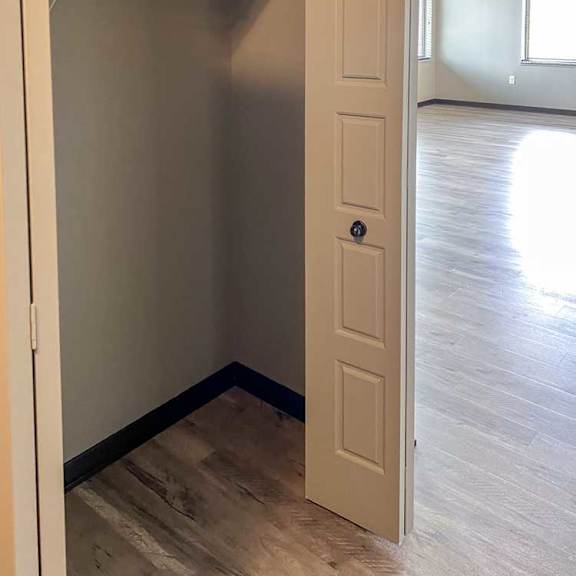 Thumbnail 19 of 20 a double door coat closet at the top of the entryway stairs