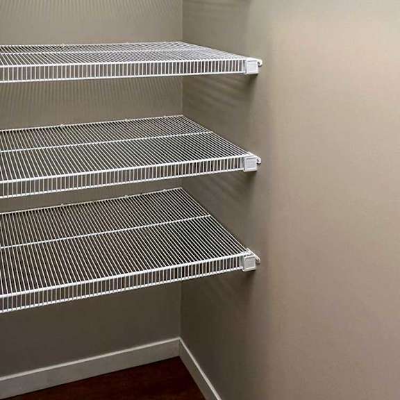Thumbnail 7 of 35 a pantry with built-in shelving