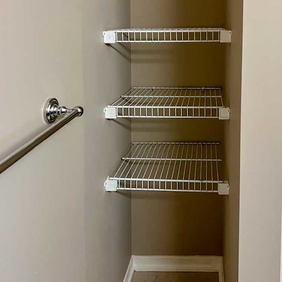 Thumbnail 11 of 35 built-in shelves in the bathroom for linens