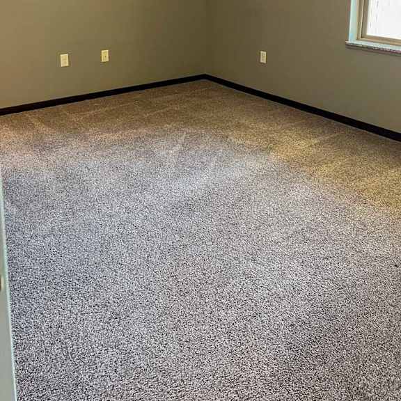 Thumbnail 21 of 35 a bedroom with carpeted flooring and a window