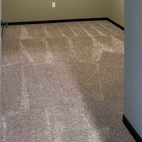 Thumbnail 3 of 19 a den space with carpeted flooring