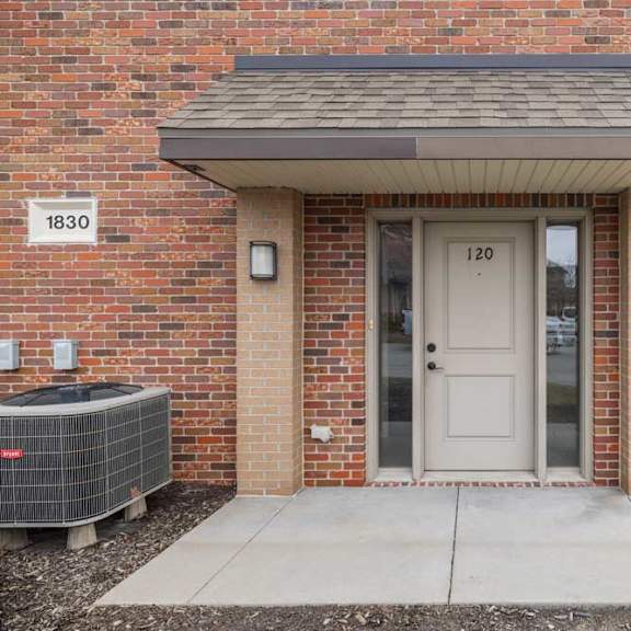 Thumbnail 4 of 25 A brick villa apartment entrance