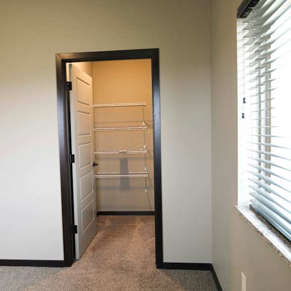 Thumbnail 11 of 43 Large bedroom with walk in closet in 3 bedroom apartment for rent at North Pointe Villas best apartments Lincoln NE 68521