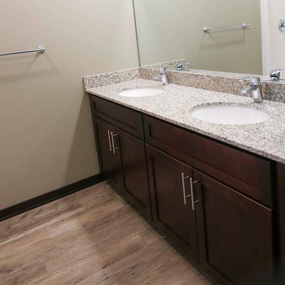 Thumbnail 17 of 43 Master bathroom with shower and double sinks with granite countertops in 3 bedroom apartment for rent at North Pointe Villas best apartments Lincoln NE 68521
