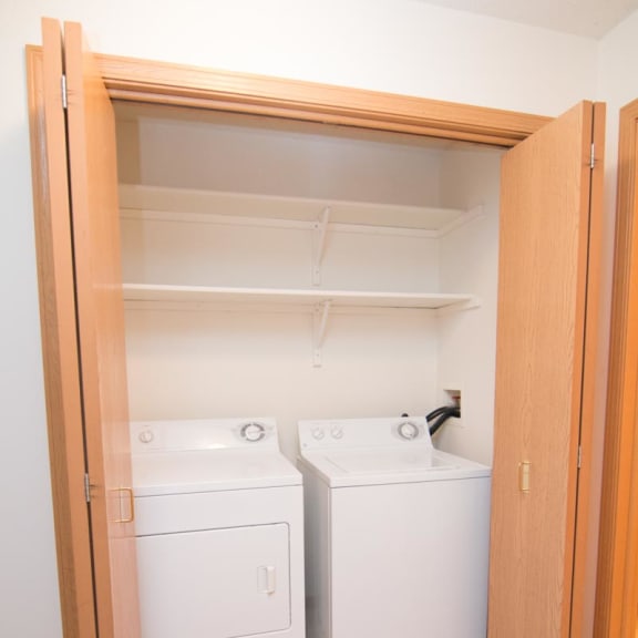 Thumbnail 11 of 15 a laundry room with a washer and dryer
