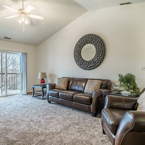 Thumbnail 5 of 14 Large roomy living room with balcony at The Northbrook Apartment Homes, Lincoln, NE