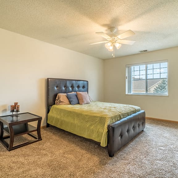Thumbnail 8 of 14 Bedroom with ceiling fan at The Northbrook Apartment Homes, Lincoln, NE