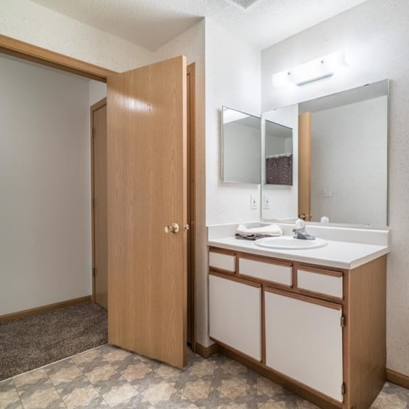Thumbnail 14 of 14 a bathroom with a toilet sink and a mirror