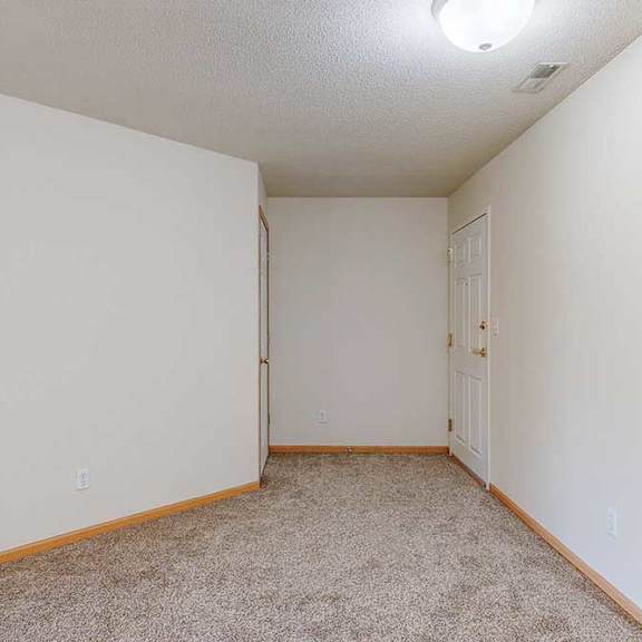 Thumbnail 2 of 31 the main floor entry way with a closet across the front door