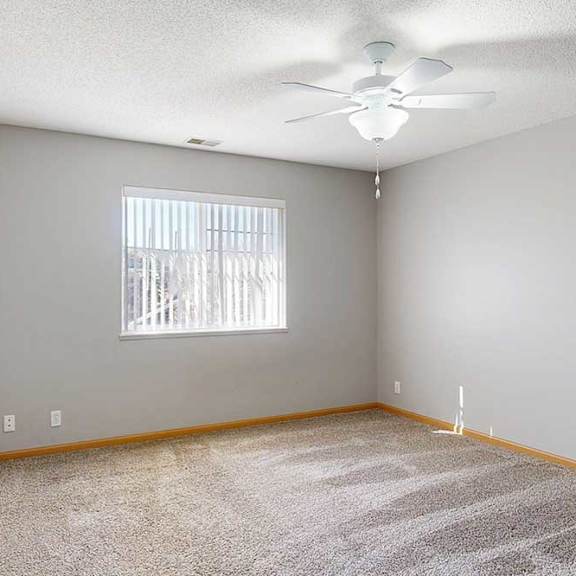 Thumbnail 15 of 61 bedroom with a ceiling fan and a window with blinds