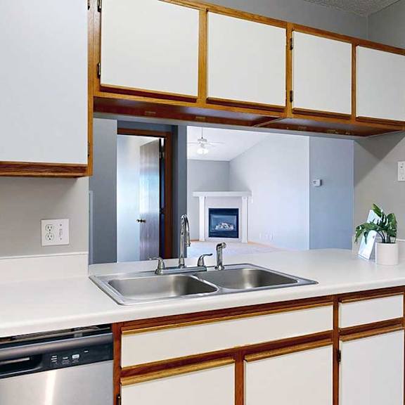 Thumbnail 23 of 27 kitchen with a white countertop and white cabinets.
