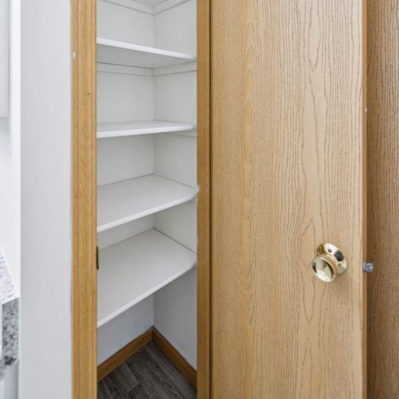 Thumbnail 34 of 56 Empty linen closet with white shelves