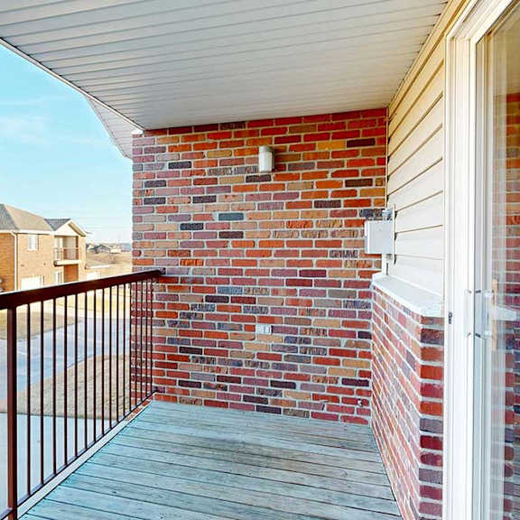 Thumbnail 27 of 28 a balcony with room for seating