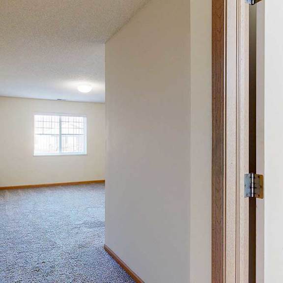 Thumbnail 18 of 28 bedroom with a carpeted floor and a window