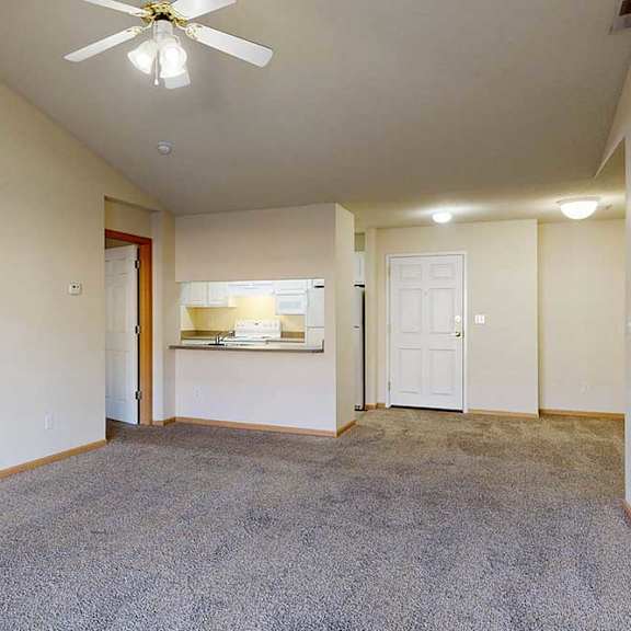 Thumbnail 11 of 28 living room with a ceiling fan and carpeted floor
