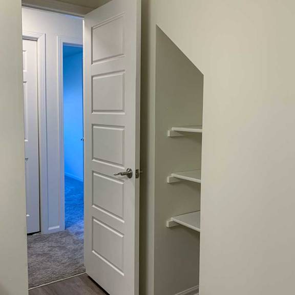 Thumbnail 13 of 16 a bathroom with built-in in-wall storage