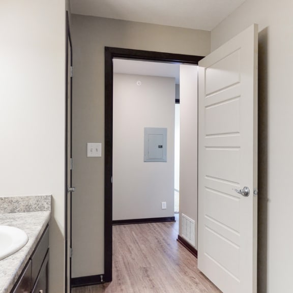 Thumbnail 10 of 10 Renovated bathroom with linen storage closet at Northridge Heights Apartments