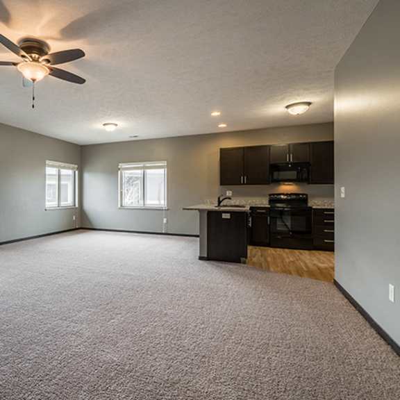Thumbnail 3 of 11 Large living space with kitchen at The Villas of Omaha at Butler Ridge in Omaha Nebraska