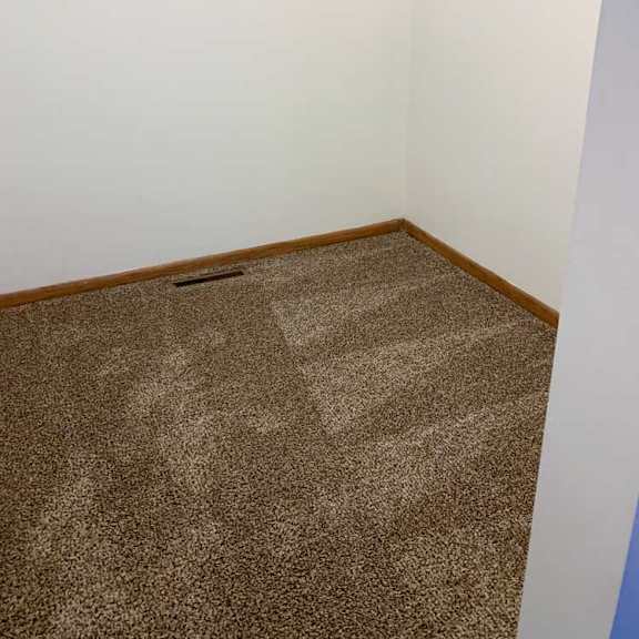 Thumbnail 25 of 30 a walk-in storage closet in the loft area with carpet flooring