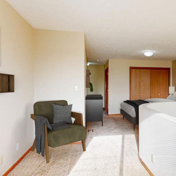 Thumbnail 20 of 40 A bedroom with a bed, chair, and a cabinet.
